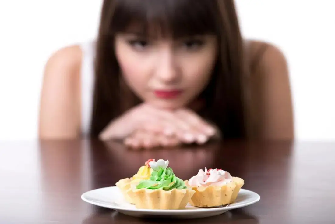 Women looking at cupcakes